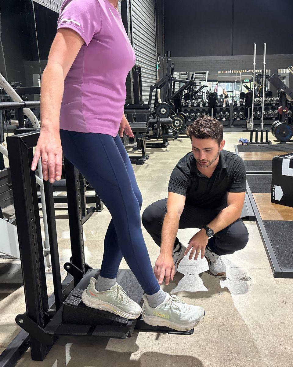 Max checking ankle position during slant-board work