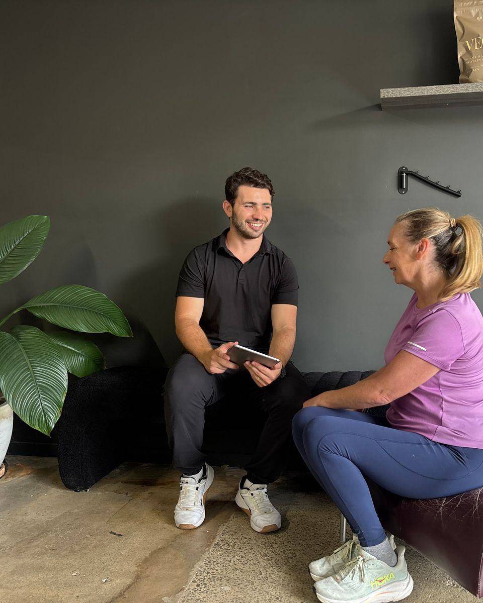 Meet Max — Solve PT Max, founder and head coach at Solve Personal Training, going through a program with a client in Brookvale